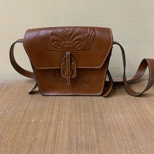 Patricia Nash leather brown cross body  8x9  17 in drop .no tags excellent